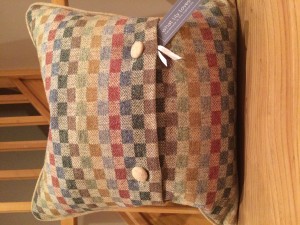 18" Feather filled cushion in ANTA Scotland fabric with piping and button detail £55 per cushion (price excludes P&P)