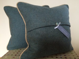 Handmade 18" feather filled cushion in Abraham Moon 100% pure new wool fabric from their Melton Wools Collection, Earth in Seagrass with Honey piping, with ceramic button detail £45 each plus P&P